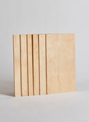 Plyco's 3mm Radiata Walnut Laserply Craft Pack, containing six sheets, on a white background