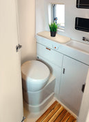 Bathroom in a RV / Caravan featuring 3mm Cappuccino Vanply for interior caravan wall panels and cabinets from Melbourne plywood supplier Plyco without a white background