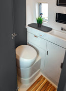 Bathroom in a RV / Caravan featuring 3mm Onyx Vanply for interior caravan wall panels and cabinets from Melbourne plywood supplier Plyco without a white background