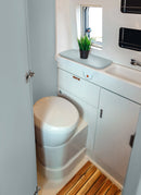 Bathroom in a RV / Caravan featuring 3mm Veldt Vanply for interior caravan wall panels and cabinets from Melbourne plywood supplier Plyco without a white background