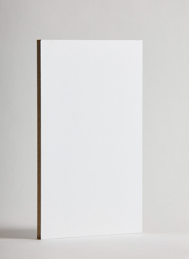 Plyco's Snow Decor Laminate pressed onto a Birch Plywood core (Decoply) on a white background